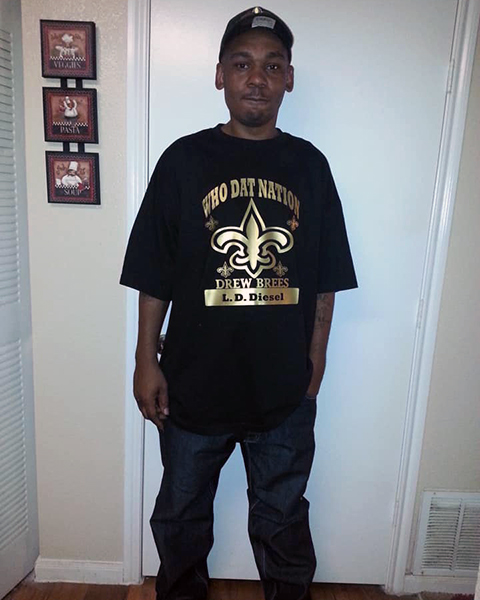 Image of a Man Wearing A Custom New Orleans Saints T-Shirt
