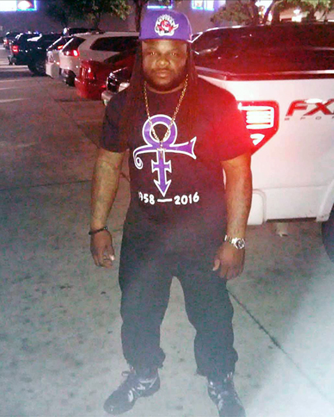 Image of a Guy Wearng a Custom Prince T-Shirt