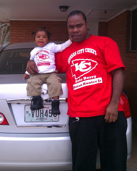 Image of a Father & Son Wearing Custom Sports Tees